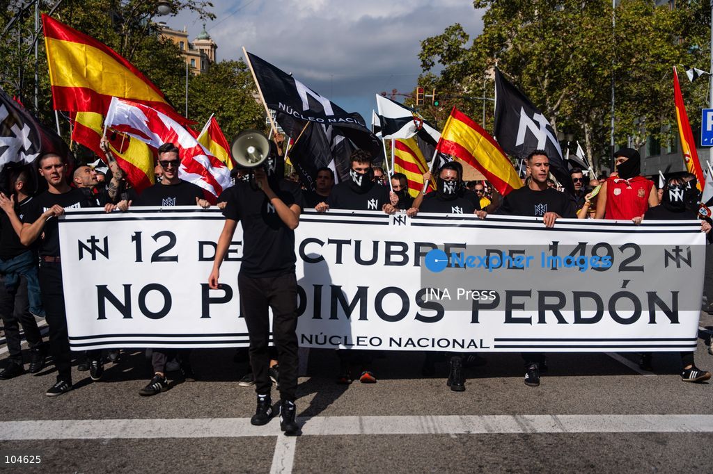 BARCELONA, SPAIN, OCTOBER 12, 2026: Demonstrators march along Passeig de Gracia in central Barcelona, waving Spanish flags during a rally marking Spain's National Day. Organised by the Unidos por Ceuta platform, the march expresses support for Ceuta and Spanish national unity. Participants include representatives and supporters of the Partido Popular (PP) and Vox, as well as members of the far-right group Nucleo Nacional. Photo by Marc Asensio Clupes / JNA Press. (Photo by Marc Asensio Clupes/JNA Press via Nexpher Images)
