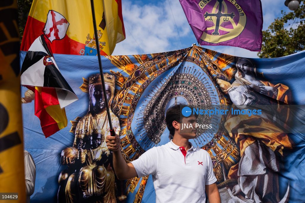 BARCELONA, SPAIN, OCTOBER 12, 2026: Demonstrators march along Passeig de Gracia in central Barcelona, waving Spanish flags during a rally marking Spain's National Day. Organised by the Unidos por Ceuta platform, the march expresses support for Ceuta and Spanish national unity. Participants include representatives and supporters of the Partido Popular (PP) and Vox, as well as members of the far-right group Nucleo Nacional. Photo by Marc Asensio Clupes / JNA Press. (Photo by Marc Asensio Clupes/JNA Press via Nexpher Images)