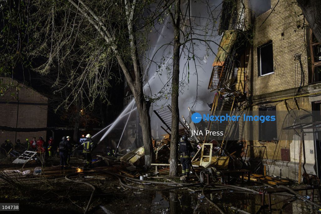 KHARKIV, UKRAINE, OCTOBER 12, 2026: Emergency workers conduct rescue operations at a residential building damaged in a Russian strike in Kharkiv's Kholodnohirskyi district. A firefighter was injured by falling concrete debris while clearing the rubble and was evacuated on a stretcher. Photo by Andrew Cling/ JNA Press. (Photo by Andrew Cling/JNA Press via Nexpher Images)