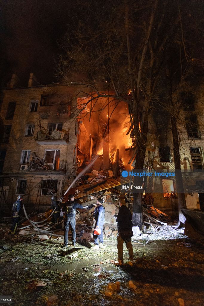 KHARKIV, UKRAINE, OCTOBER 12, 2026: Emergency workers conduct rescue operations at a residential building damaged in a Russian strike in Kharkiv's Kholodnohirskyi district. A firefighter was injured by falling concrete debris while clearing the rubble and was evacuated on a stretcher. Photo by Andrew Cling/ JNA Press. (Photo by Andrew Cling/JNA Press via Nexpher Images)