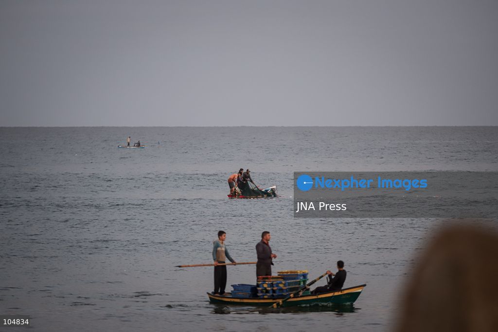 GAZA, PALESTINE, OCTOBER 13, 2026: Palestinian fishermen remove crabs from their fishing nets at Gaza City's seaport as they work to earn their daily livelihood. Photo by Mohammed M. Skaik / JNA Press (Photo by Mohammed M Skaik/JNA Press via Nexpher Images)