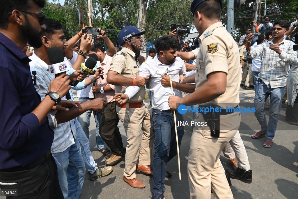 PATNA, INDIA, OCTOBER 13, 2026: Police detain students of the All India Students’ Association (AISA), who took out a protest march toward Lok Bhavan, formerly Raj Bhavan, at JP roundabout in Patna, demanding the resignation of Chief Election Commissioner Gyanesh Kumar and the cancellation or review of the Special Intensive Revision (SIR) of electoral rolls. Photo by Rahul Sharma / JNA Press (Photo by Rahul Sharma/JNA Press via Nexpher Images)