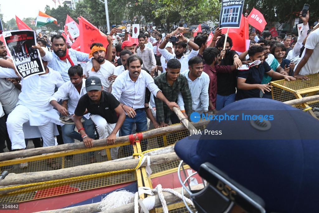 PATNA, INDIA, OCTOBER 13, 2026: Police detain students of the All India Students’ Association (AISA), who took out a protest march toward Lok Bhavan, formerly Raj Bhavan, at JP roundabout in Patna, demanding the resignation of Chief Election Commissioner Gyanesh Kumar and the cancellation or review of the Special Intensive Revision (SIR) of electoral rolls. Photo by Rahul Sharma / JNA Press (Photo by Rahul Sharma/JNA Press via Nexpher Images)