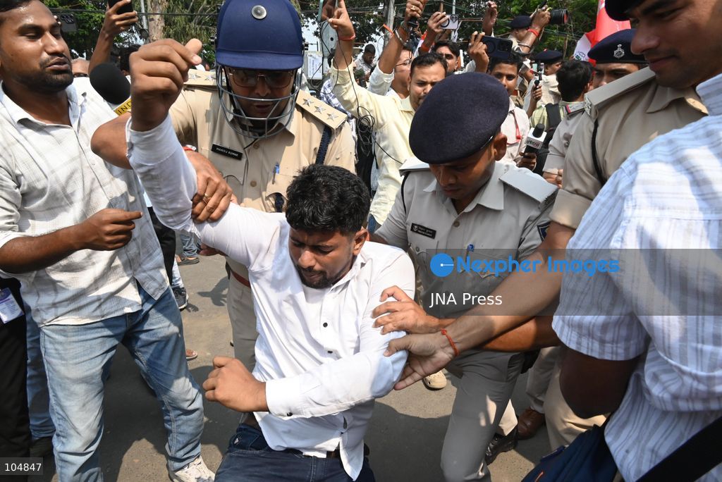 PATNA, INDIA, OCTOBER 13, 2026: Police detain students of the All India Students’ Association (AISA), who took out a protest march toward Lok Bhavan, formerly Raj Bhavan, at JP roundabout in Patna, demanding the resignation of Chief Election Commissioner Gyanesh Kumar and the cancellation or review of the Special Intensive Revision (SIR) of electoral rolls. Photo by Rahul Sharma / JNA Press (Photo by Rahul Sharma/JNA Press via Nexpher Images)