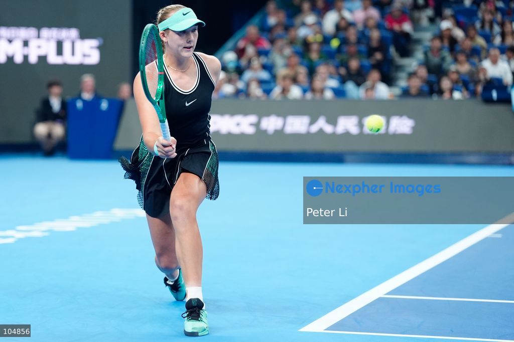 Mirra Andreeva in action against Qinwen Zheng of China during their women's singles final match on day eleven of China Open at the National Tennis Center on October 11, 2026 in Beijing, China. (Photo by Peter Li/Nexpher Images)