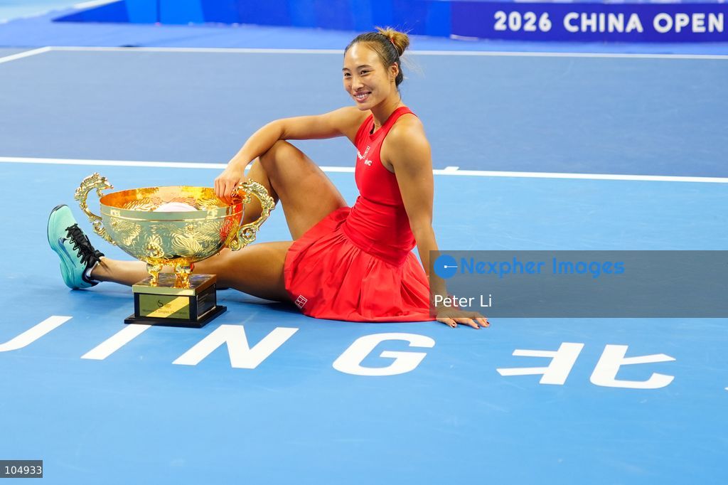 Zheng Qinwen of China defeated Mirra Andreeva 2-0 to claim the women's singles title at the 2026 China Open in Beijing on October 11, 2026. It was Zheng's first WTA 1000 title, making her the first home player to win the China Open women's singles. Zheng is pictured holding the trophy. (Photo by Peter Li/Nexpher Images)