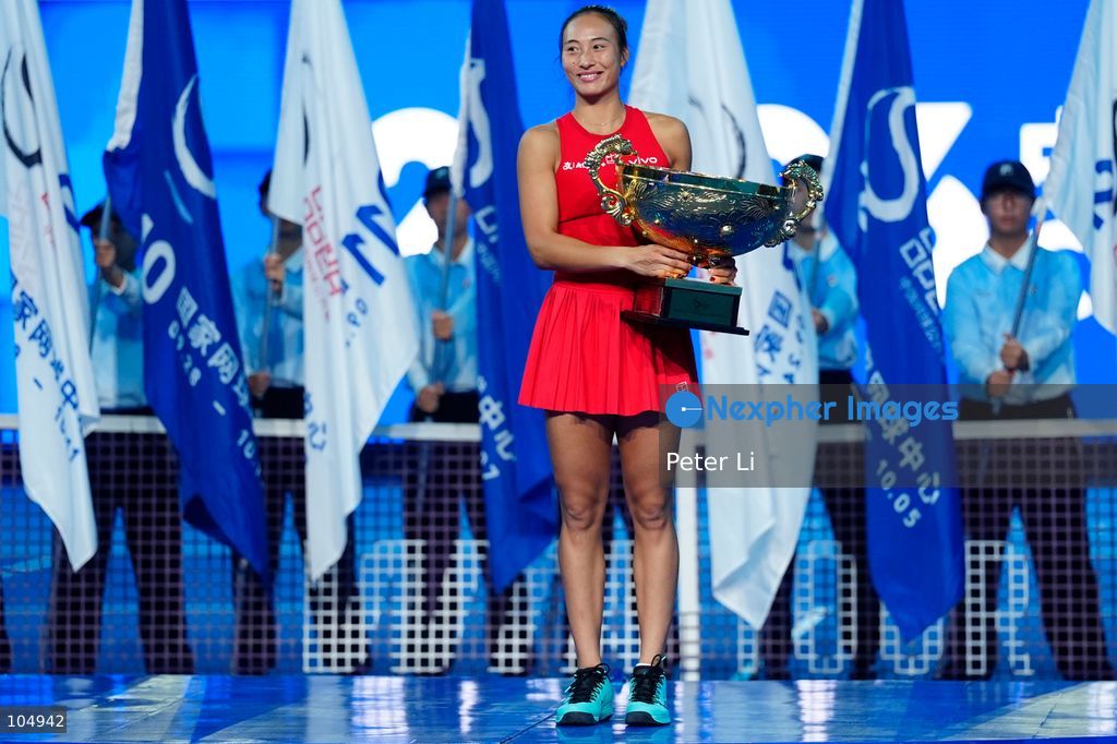 Qinwen Zheng of China,Chinese actor Jin Dong and Mirra Andreeva pose for a photograph before the Women's Singles final match on day eleven of China Open at the National Tennis Center on October 11, 2026 in Beijing, China. (Photo by Peter Li/Nexpher Images)