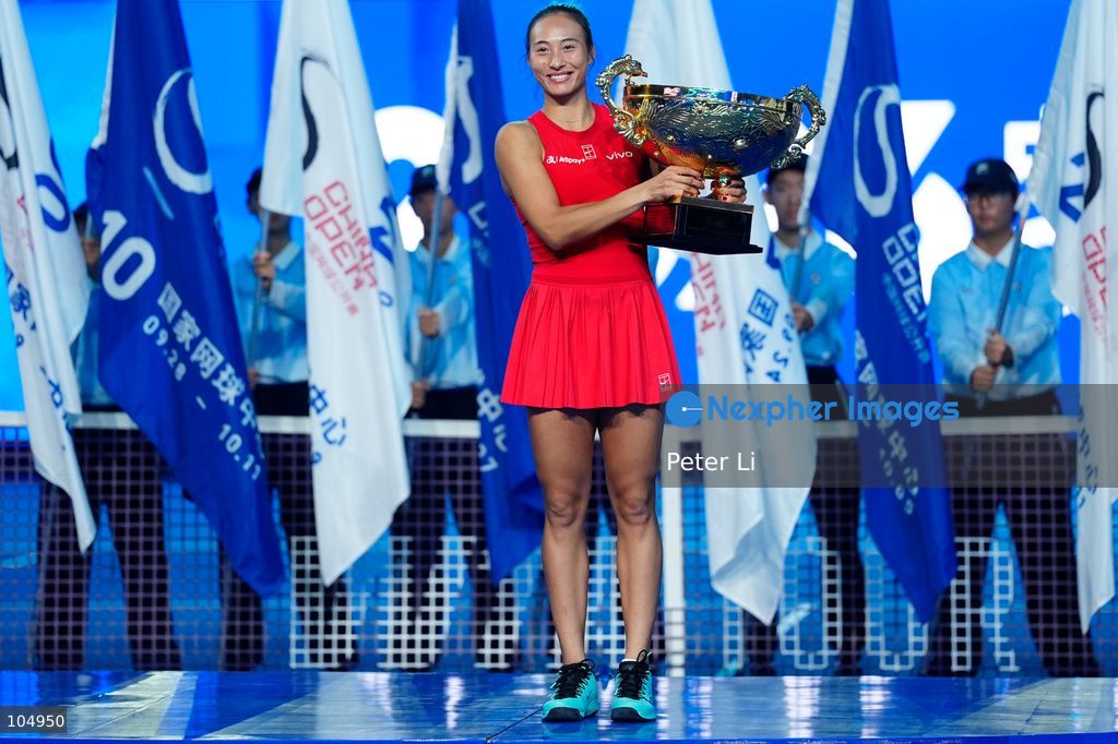Qinwen Zheng of China,Chinese actor Jin Dong and Mirra Andreeva pose for a photograph before the Women's Singles final match on day eleven of China Open at the National Tennis Center on October 11, 2026 in Beijing, China. (Photo by Peter Li/Nexpher Images)