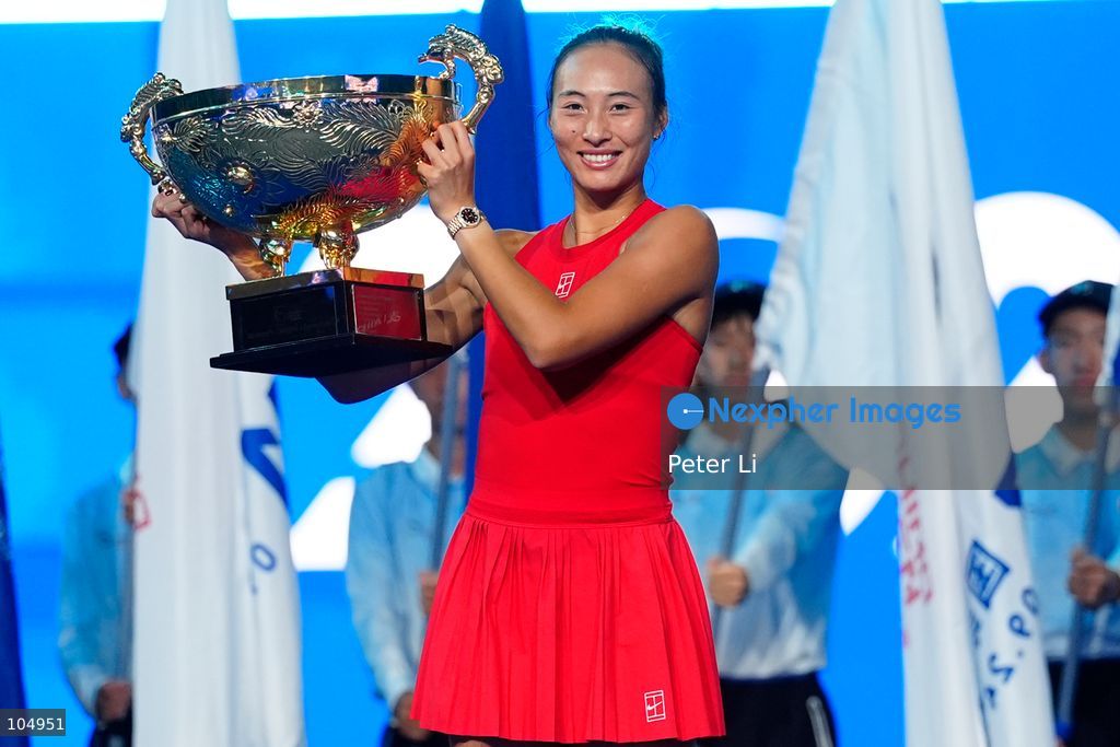 Qinwen Zheng of China,Chinese actor Jin Dong and Mirra Andreeva pose for a photograph before the Women's Singles final match on day eleven of China Open at the National Tennis Center on October 11, 2026 in Beijing, China. (Photo by Peter Li/Nexpher Images)