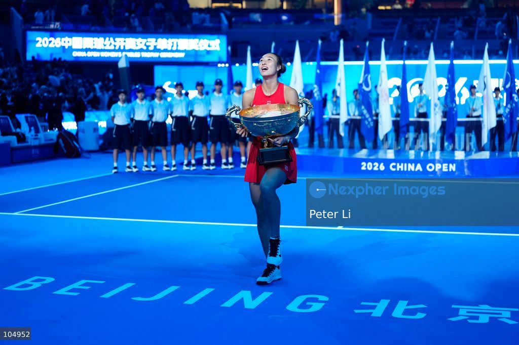 Qinwen Zheng of China,Chinese actor Jin Dong and Mirra Andreeva pose for a photograph before the Women's Singles final match on day eleven of China Open at the National Tennis Center on October 11, 2026 in Beijing, China. (Photo by Peter Li/Nexpher Images)