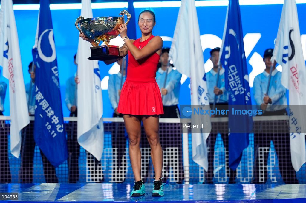 Qinwen Zheng of China,Chinese actor Jin Dong and Mirra Andreeva pose for a photograph before the Women's Singles final match on day eleven of China Open at the National Tennis Center on October 11, 2026 in Beijing, China. (Photo by Peter Li/Nexpher Images)