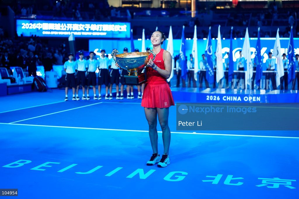 Qinwen Zheng of China,Chinese actor Jin Dong and Mirra Andreeva pose for a photograph before the Women's Singles final match on day eleven of China Open at the National Tennis Center on October 11, 2026 in Beijing, China. (Photo by Peter Li/Nexpher Images)