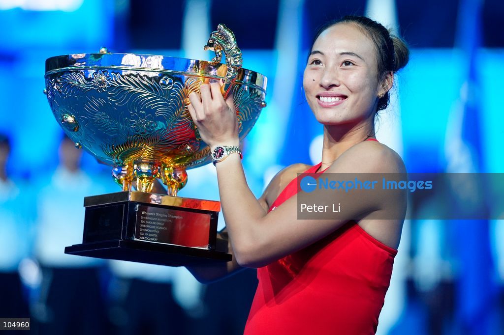 Qinwen Zheng of China,Chinese actor Jin Dong and Mirra Andreeva pose for a photograph before the Women's Singles final match on day eleven of China Open at the National Tennis Center on October 11, 2026 in Beijing, China. (Photo by Peter Li/Nexpher Images)