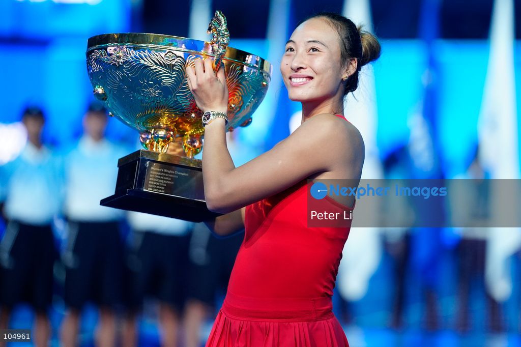 Qinwen Zheng of China,Chinese actor Jin Dong and Mirra Andreeva pose for a photograph before the Women's Singles final match on day eleven of China Open at the National Tennis Center on October 11, 2026 in Beijing, China. (Photo by Peter Li/Nexpher Images)