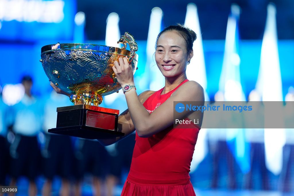 Qinwen Zheng of China,Chinese actor Jin Dong and Mirra Andreeva pose for a photograph before the Women's Singles final match on day eleven of China Open at the National Tennis Center on October 11, 2026 in Beijing, China. (Photo by Peter Li/Nexpher Images)