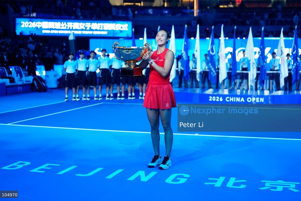 Qinwen Zheng of China,Chinese actor Jin Dong and Mirra Andreeva pose for a photograph before the Women's Singles final match on day eleven of China Open at the National Tennis Center on October 11, 2026 in Beijing, China. (Photo by Peter Li/Nexpher Images)