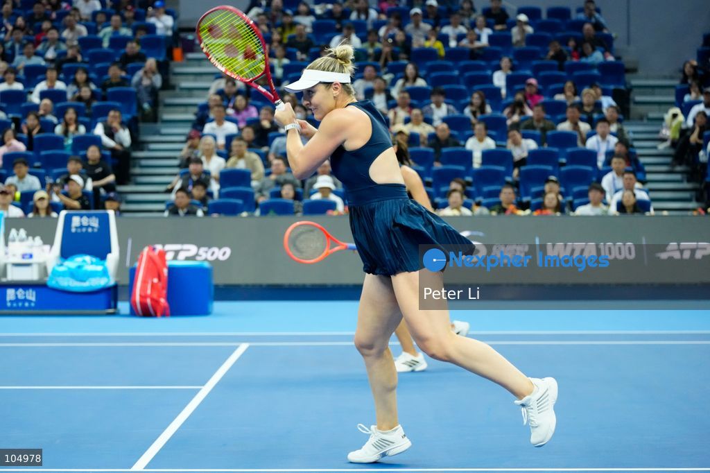 Gabriela Dabrowski of Canada and Luisa Stefani of Brazil defeated Zhang Shuai of China and Katerina Siniakova of the Czech Republic 2-0 in the women's doubles final at the Diamond Court of the National Tennis Center in Beijing, China, on October 11, 2026. Stefani (R) and Dabrowski are seen discussing their serving tactics. (Photo by Peter Li/Nexpher Images)