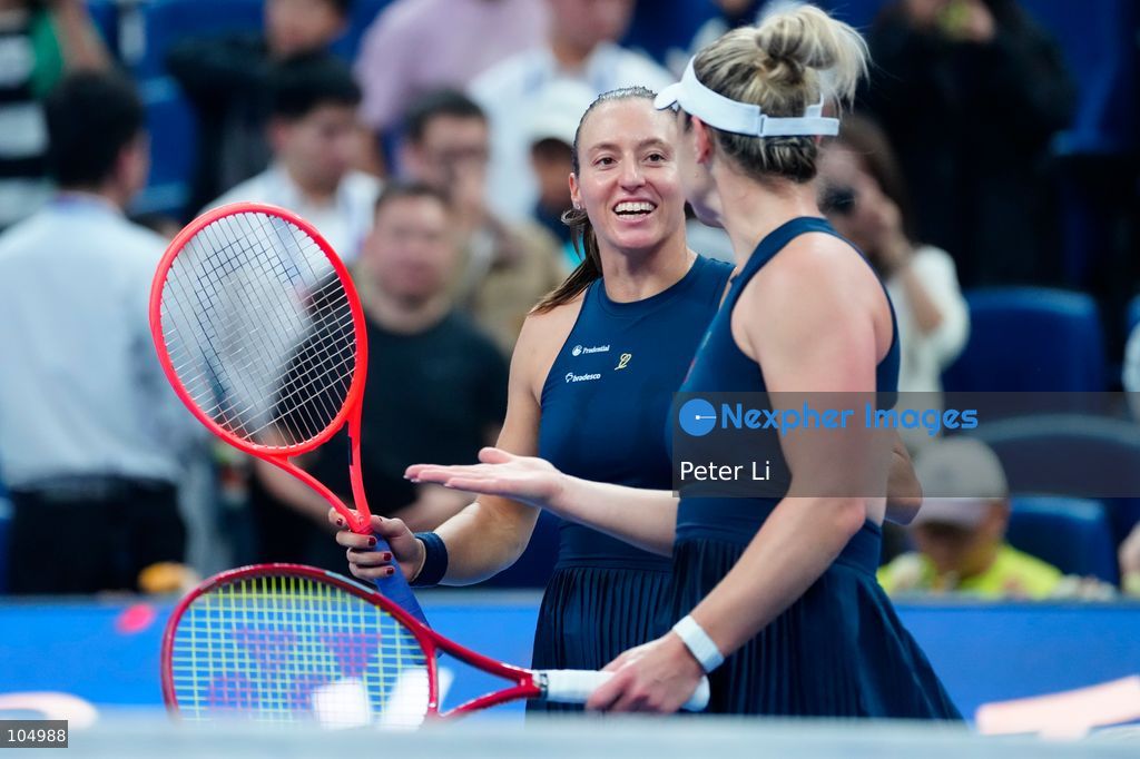 Gabriela Dabrowski of Canada and Luisa Stefani of Brazil celebrates winning against Zhang Shuai of China and Katerina Siniakova of the Czech Republic 2-0 in the women's doubles final at the Diamond Court of the National Tennis Center in Beijing, China, on October 11, 2026. Stefani (R) and Dabrowski are seen discussing their serving tactics. (Photo by Peter Li/Nexpher Images)
