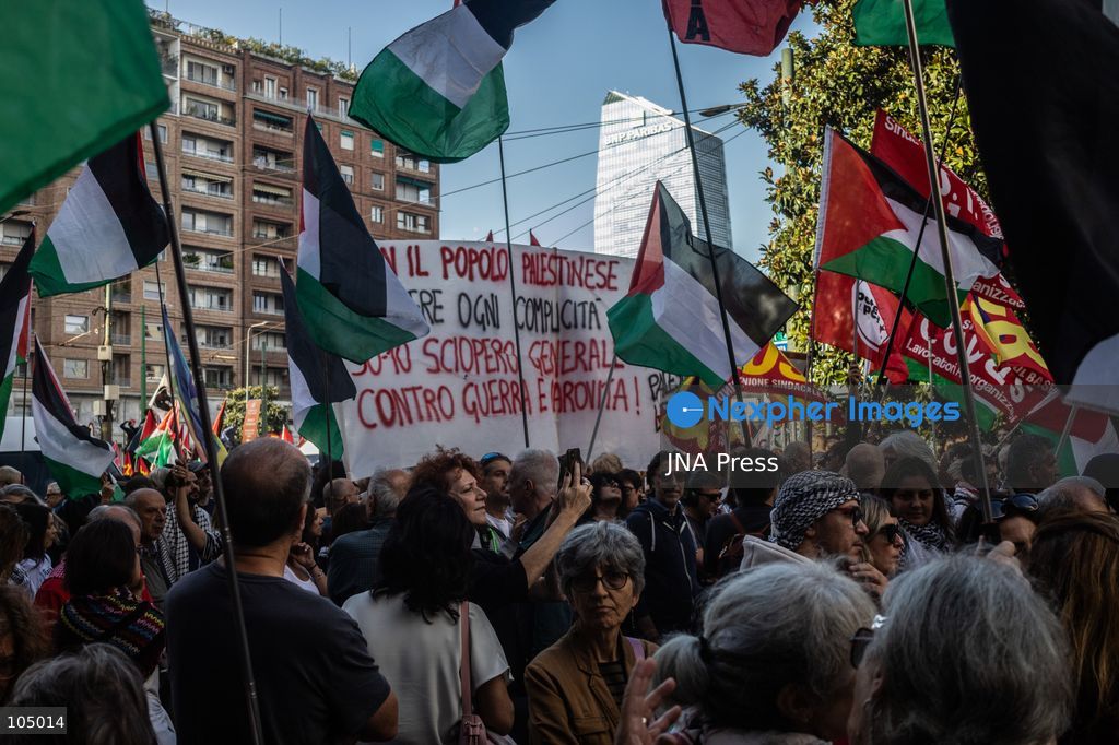 TOP PICS - MILAN, ITALY, OCTOBER 10, 2026: Thousands of demonstrators march through central Milan in solidarity with Palestinians, marking three years since the start of the war in Gaza. Protesters carry Palestinian flags, banners and placards as they march from Piazza della Repubblica toward Piazza San Babila, calling for an end to Israel's military operations in Gaza, an arms embargo and the suspension of agreements with Israel. The demonstration was part of a nationwide mobilization organized by Palestinian groups and supporting organizations across Italy. Photo by Nadia Caimi / JNA Press. (Photo by Nadia Caimi/JNA Press via Nexpher Images)