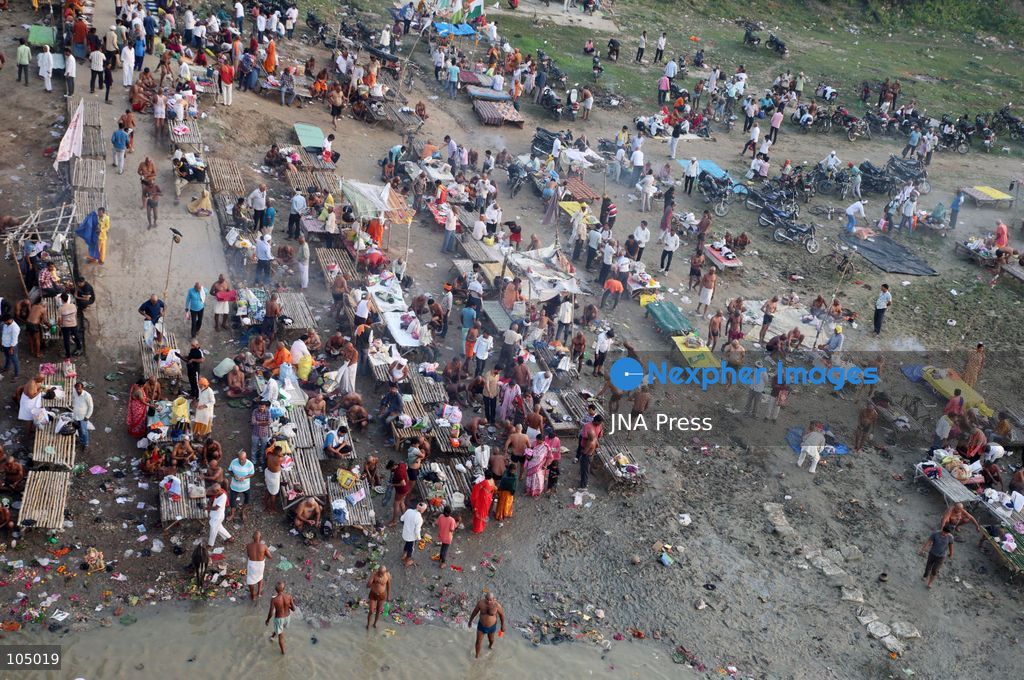 TOP PICS - PRAYAGRAJ, INDIA, OCTOBER 11, 2026: Hindu devotees take a holy dip in the Ganga River at Phaphamau in Prayagraj, Uttar Pradesh, on the first day of the nine-day Navratri festival. The religious festival is dedicated to the worship of the Hindu goddess Durga and her nine forms, with devotees observing prayers, fasting and traditional rituals throughout the celebrations. Photo by Jitendra Prakash / JNA Press. (Photo by Jitendra Prakash/JNA Press via Nexpher Images)