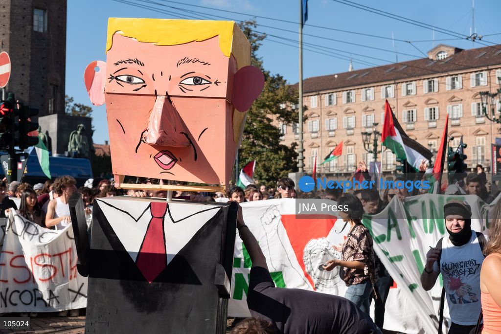TOP PICS - TURIN, ITALY, OCTOBER 10, 2026: Thousands of demonstrators march through the streets of Turin during a regional protest in solidarity with Palestine. Participants from across the Piedmont region gathered for the demonstration organized by Torino per Gaza, waving Palestinian flags and carrying banners as they marched through the city center. The procession passed through several neighborhoods, including Barriera di Milano, before returning toward central Turin. Italian news agency ANSA estimated attendance at around 8,000, while organizers claimed 20,000 participants. Photo by Camilla Baronetto / JNA Press. (Photo by Camilla Baronetto/JNA Press via Nexpher Images)