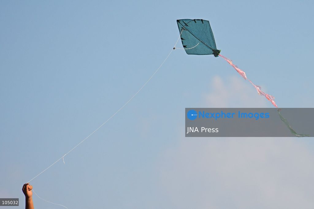 KATHMANDU, NEPAL, OCTOBER 13, 2026: A child flies a kite during the Dashain festival in Kathmandu, Nepal. Dashain, Nepal’s biggest Hindu festival, is celebrated over 15 days and commemorates the victory of good over evil, with devotees worshipping Goddess Durga. Kite flying is a popular tradition during Dashain, as the festival coincides with the arrival of autumn, when clearer skies and favorable winds provide ideal conditions. According to popular belief, flying kites high into the sky conveys a message to Indra, the Hindu god of rain, that the monsoon rains are no longer needed. The tradition is also associated with seasonal change, outdoor recreation and bringing families and communities together during the festive period. Photo by Safal Prakash Shrestha / JNA Press (Photo by Safal Prakash Shrestha/JNA Press via Nexpher Images)