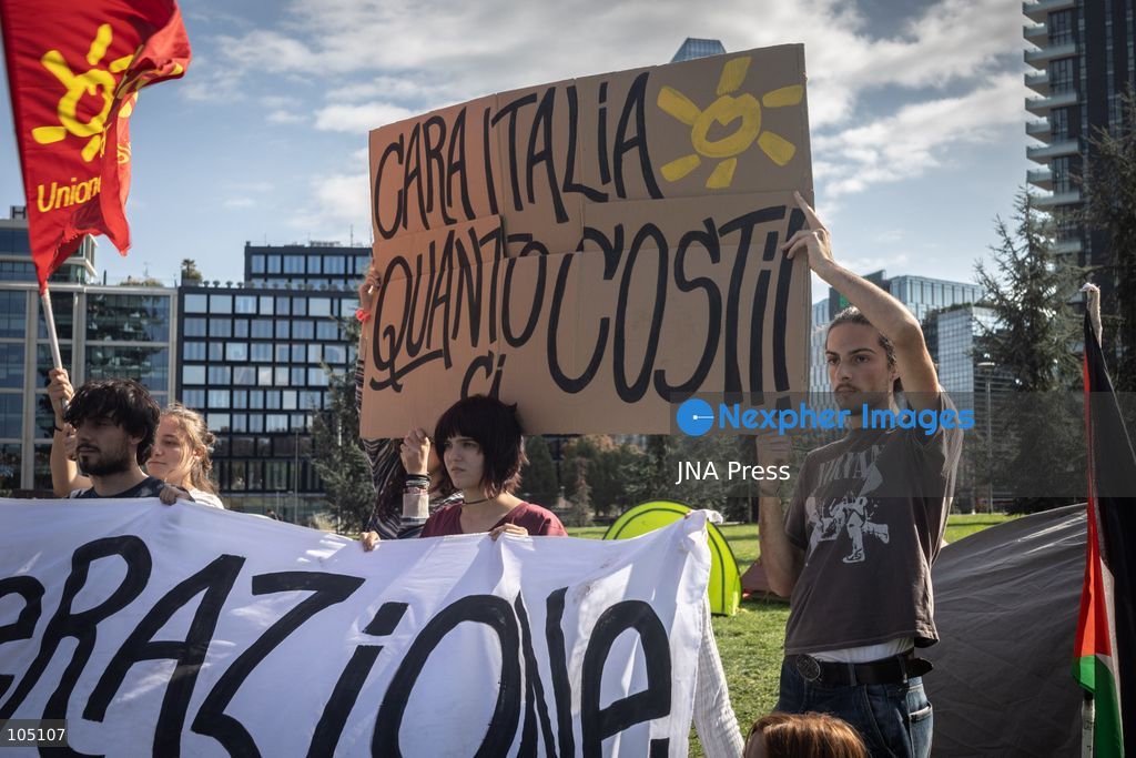 MILAN, ITALY, OCTOBER 12, 2026: A small group of roughly ten student activists gathers outside the COIMA headquarters, near the Bosco Verticale (Vertical Forest), to protest the high cost of living, soaring housing prices and the commodification of education. Organized by student groups UDU Milano and UDU Statale, the demonstration highlights the steep deficit in affordable student housing, noting that Milan hosts roughly 100,000 out-of-town students but offers fewer than 16,000 public university residential beds. Banners at the protest read ‘Generazione all’Asta’ (Generation at Auction) and ‘Cara Italia quanto ci costi’ (Dear Italy, how much you cost us), demanding immediate public funding for transport, public services and the fundamental right to study. Photo by Nadia Caimi / JNA Press (Photo by Nadia Caimi/JNA Press via Nexpher Images)