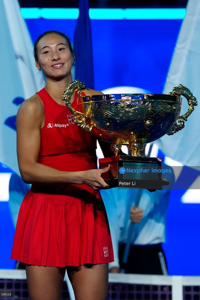 Zheng Qinwen of China poses with her trophy after winning her Womens Singles final match against Mirra Andreeva of the Russia at the China Open tennis tournament in Beijing, China, 11 October 2026. (Photo by Peter Li/Nexpher Images)