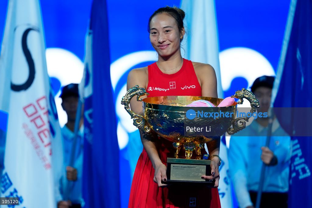 Zheng Qinwen of China poses with her trophy after winning her Womens Singles final match against Mirra Andreeva of the Russia at the China Open tennis tournament in Beijing, China, 11 October 2026. (Photo by Peter Li/Nexpher Images)