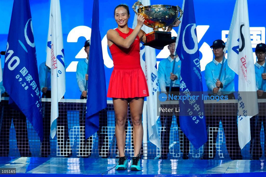 Zheng Qinwen of China poses with her trophy after winning her Womens Singles final match against Mirra Andreeva of the Russia at the China Open tennis tournament in Beijing, China, 11 October 2026. (Photo by Peter Li/Nexpher Images)