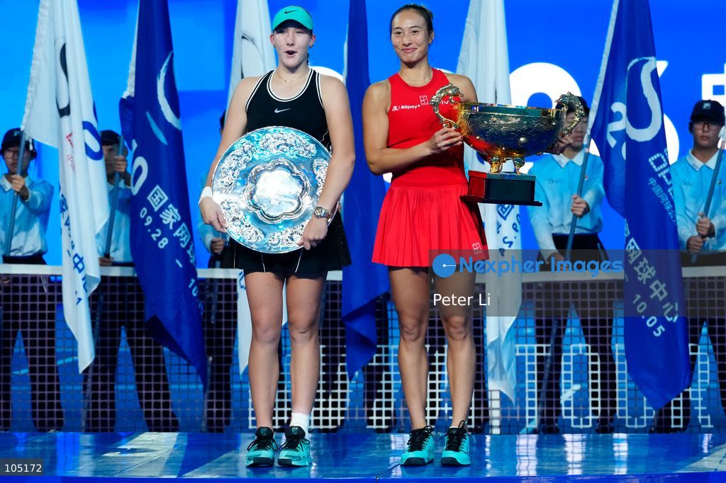 Zheng Qinwen of China poses with her trophy after winning her Womens Singles final match against Mirra Andreeva of the Russia at the China Open tennis tournament in Beijing, China, 11 October 2026. (Photo by Peter Li/Nexpher Images)