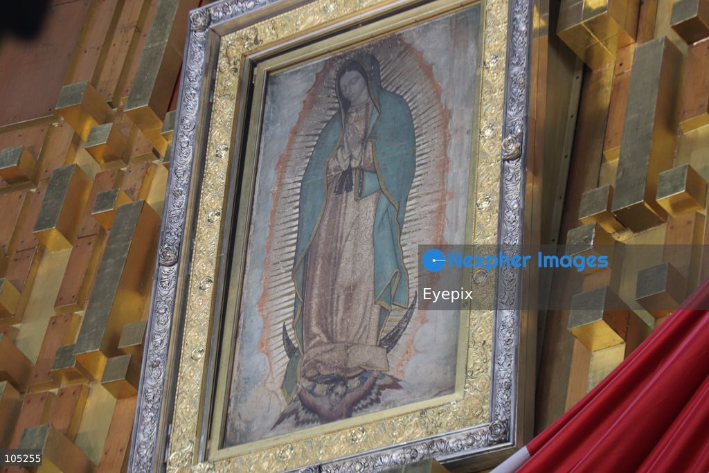 A low-angle view of the official replica of the sacred image of Our Lady of Guadalupe , is seen inside the Basilica of Our Lady of Guadalupe during the commemoration of the 50th anniversary of the dedication and opening of the New Basilica on October 12, 2026 in Mexico City, Mexico. The modern circular sanctuary, designed by architect Pedro Ramírez Vázquez, was inaugurated on October 12, 1976, to safely house the sacred cloak of the Virgin of Guadalupe. (Photo by Carlos Santiago/ Eyepix Group) (Photo by Carlos Santiago/ Eyepix Group/Eyepix via Nexpher Images)
