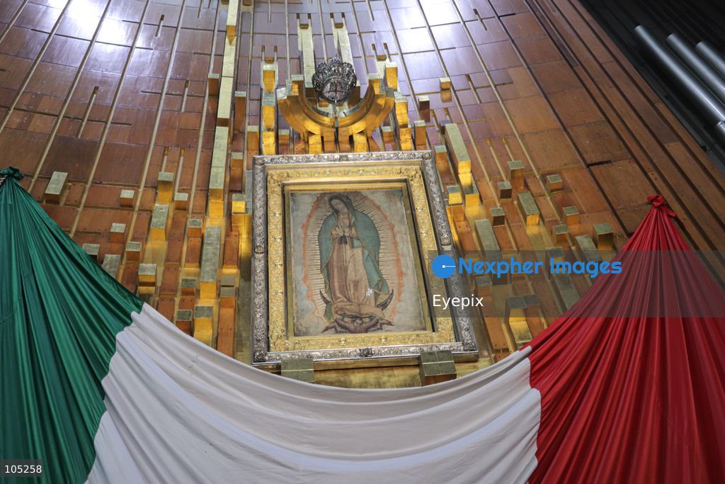 A low-angle view of the official replica of the sacred image of Our Lady of Guadalupe , is seen inside the Basilica of Our Lady of Guadalupe during the commemoration of the 50th anniversary of the dedication and opening of the New Basilica on October 12, 2026 in Mexico City, Mexico. The modern circular sanctuary, designed by architect Pedro Ramírez Vázquez, was inaugurated on October 12, 1976, to safely house the sacred cloak of the Virgin of Guadalupe. (Photo by Carlos Santiago/ Eyepix Group) (Photo by Carlos Santiago/ Eyepix Group/Eyepix via Nexpher Images)