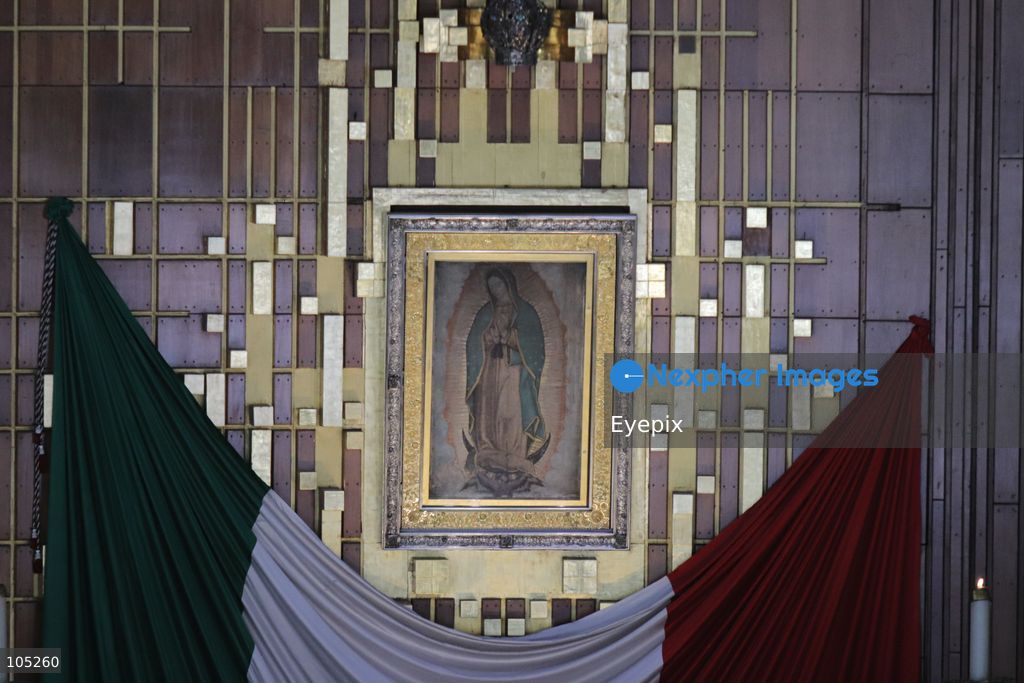 The sacred tilma (cloak) bearing the image of Our Lady of Guadalupe, is seen behind the main altar inside the Basilica of Our Lady of Guadalupe during the commemoration of the 50th anniversary of the dedication and opening of the New Basilica on October 12, 2026 in Mexico City, Mexico. The modern circular sanctuary, designed by architect Pedro Ramírez Vázquez, was inaugurated on October 12, 1976, to safely house the sacred cloak of the Virgin of Guadalupe. (Photo by Carlos Santiago/ Eyepix Group) (Photo by Carlos Santiago/ Eyepix Group/Eyepix via Nexpher Images)