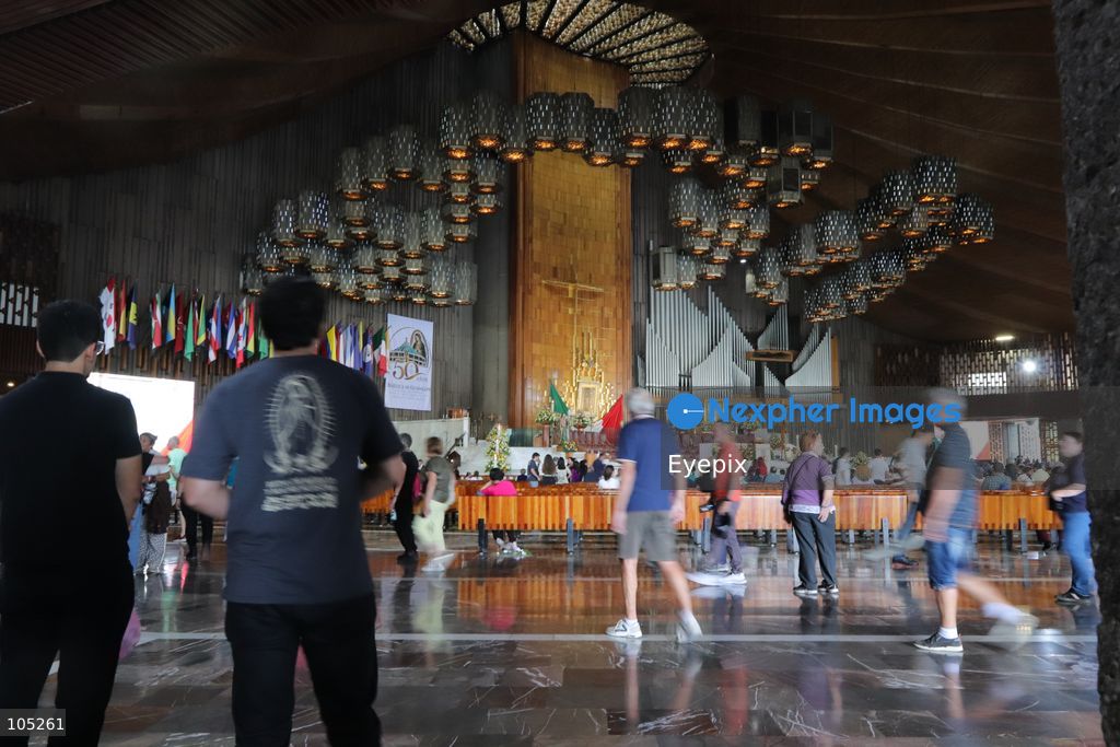People gather the Basilica of Our Lady of Guadalupe during the commemoration of the 50th anniversary of the dedication and opening of the New Basilica on October 12, 2026 in Mexico City, Mexico. The modern circular sanctuary, designed by architect Pedro Ramírez Vázquez, was inaugurated on October 12, 1976, to safely house the sacred cloak of the Virgin of Guadalupe. (Photo by Carlos Santiago/ Eyepix Group) (Photo by Carlos Santiago/ Eyepix Group/Eyepix via Nexpher Images)
