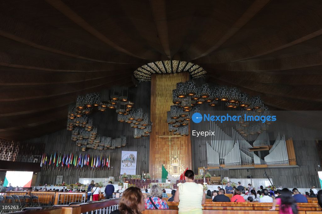 People gather the Basilica of Our Lady of Guadalupe during the commemoration of the 50th anniversary of the dedication and opening of the New Basilica on October 12, 2026 in Mexico City, Mexico. The modern circular sanctuary, designed by architect Pedro Ramírez Vázquez, was  inaugurated on October 12, 1976, to safely house the sacred cloak of the Virgin of Guadalupe. (Photo by Carlos Santiago/ Eyepix Group) (Photo by Carlos Santiago/  Eyepix Group/Eyepix via Nexpher Images)