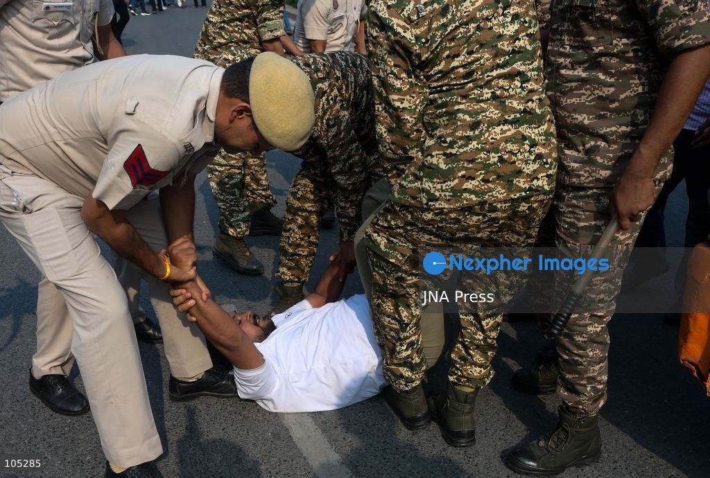 NEW DELHI, INDIA, OCTOBER 13, 2026: Security personnel detain members of the National Students' Union of India (NSUI), the student wing of the Indian National Congress, during a protest at Connaught Place in New Delhi. Demonstrators demand the resignation of Chief Election Commissioner Gyanesh Kumar over alleged electoral irregularities. Photo by Vishal Kapoor / JNA Press. (Photo by Vishal Kapoor/JNA Press via Nexpher Images)