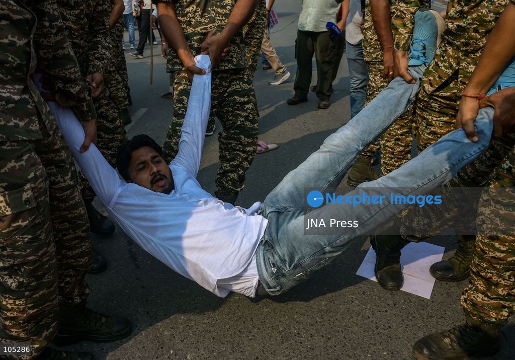NEW DELHI, INDIA, OCTOBER 13, 2026: Security personnel detain members of the National Students' Union of India (NSUI), the student wing of the Indian National Congress, during a protest at Connaught Place in New Delhi. Demonstrators demand the resignation of Chief Election Commissioner Gyanesh Kumar over alleged electoral irregularities. Photo by Vishal Kapoor / JNA Press. (Photo by Vishal Kapoor/JNA Press via Nexpher Images)