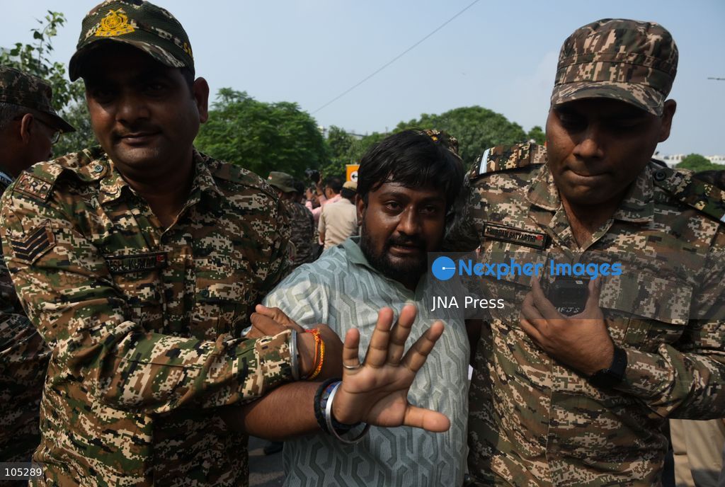 NEW DELHI, INDIA, OCTOBER 13, 2026: Security personnel detain members of the National Students' Union of India (NSUI), the student wing of the Indian National Congress, during a protest at Connaught Place in New Delhi. Demonstrators demand the resignation of Chief Election Commissioner Gyanesh Kumar over alleged electoral irregularities. Photo by Vishal Kapoor / JNA Press. (Photo by Vishal Kapoor/JNA Press via Nexpher Images)