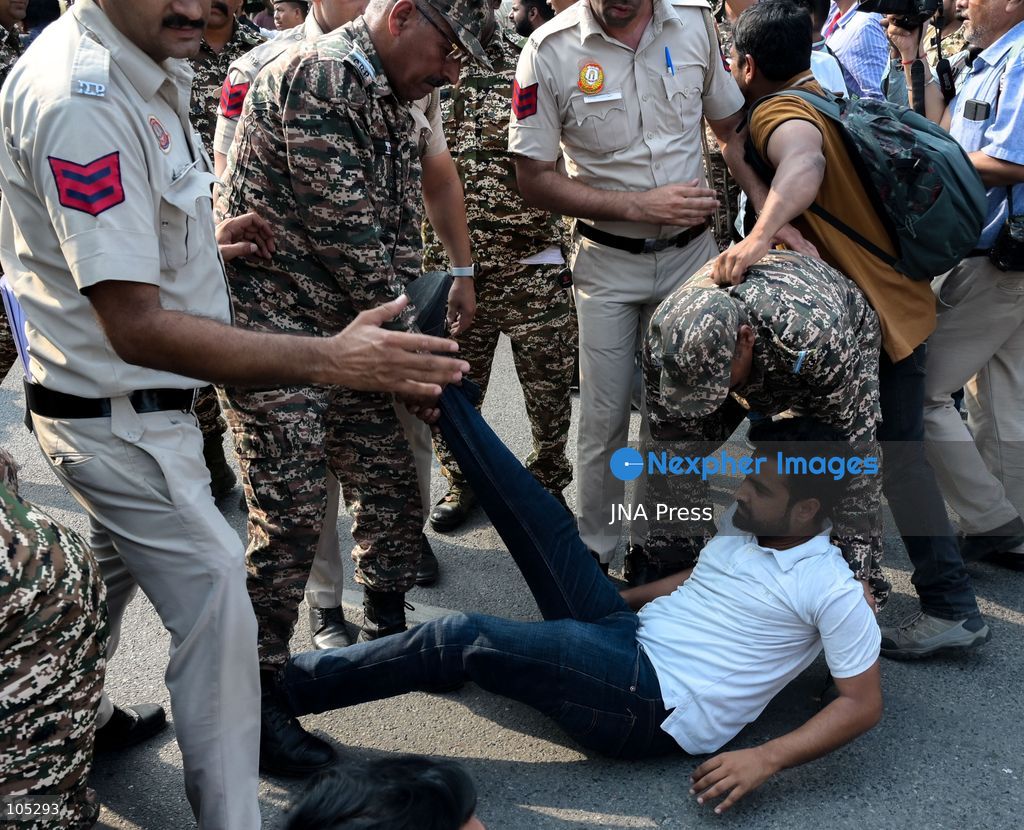 NEW DELHI, INDIA, OCTOBER 13, 2026: Security personnel detain members of the National Students' Union of India (NSUI), the student wing of the Indian National Congress, during a protest at Connaught Place in New Delhi. Demonstrators demand the resignation of Chief Election Commissioner Gyanesh Kumar over alleged electoral irregularities. Photo by Vishal Kapoor / JNA Press. (Photo by Vishal Kapoor/JNA Press via Nexpher Images)