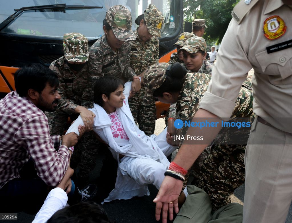 NEW DELHI, INDIA, OCTOBER 13, 2026: Security personnel detain members of the National Students' Union of India (NSUI), the student wing of the Indian National Congress, during a protest at Connaught Place in New Delhi. Demonstrators demand the resignation of Chief Election Commissioner Gyanesh Kumar over alleged electoral irregularities. Photo by Vishal Kapoor / JNA Press. (Photo by Vishal Kapoor/JNA Press via Nexpher Images)