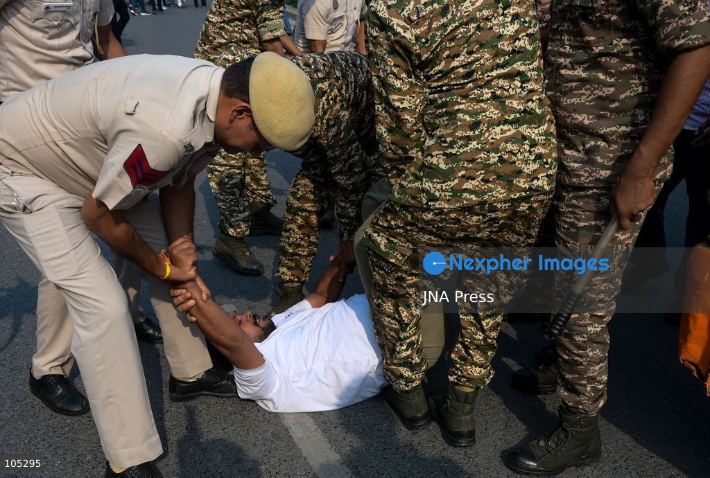 NEW DELHI, INDIA, OCTOBER 13, 2026: Security personnel detain members of the National Students' Union of India (NSUI), the student wing of the Indian National Congress, during a protest at Connaught Place in New Delhi. Demonstrators demand the resignation of Chief Election Commissioner Gyanesh Kumar over alleged electoral irregularities. Photo by Vishal Kapoor / JNA Press. (Photo by Vishal Kapoor/JNA Press via Nexpher Images)