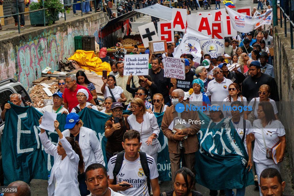 CARACAS, VENEZUELA, OCTOBER 13, 2026: Healthcare workers, teachers and university staff march in central Caracas to demand higher wages and improved working conditions. The demonstration sets out from the Sagrado Corazon de Jesus area towards Miraflores Palace amid concerns over declining purchasing power. Photo by Mario Flores / JNA Press. (Photo by Mario Flores/JNA Press via Nexpher Images)