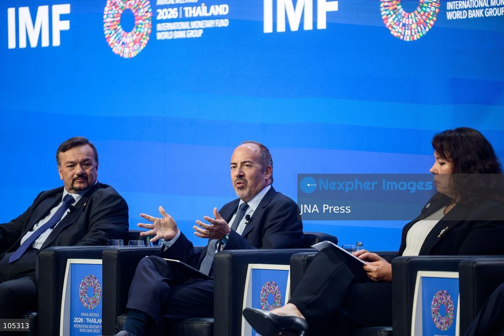 BANGKOK, THAILAND - OCTOBER 13, 2026: Governor of Banco de Portugal Álvaro Santos Pereira (C) speaks as Malaysia’s Minister of Finance II Datuk Seri Amir Hamzah Azizan (L), and IMF Monetary and Capital Markets Department Deputy Director Michaela Erbenova (R) take part in “Mitigating Sovereign Risks in Market-Access Countries” during the 2026 Annual Meetings of the International Monetary Fund (IMF) and the World Bank Group in Bangkok. The discussion focuses on managing sovereign risks and strengthening public debt management in countries with access to international capital markets. Photo by Watsawat Koktabtim / JNA Press. (Photo by Watsawat "James" Koktabtim/JNA Press via Nexpher Images)
