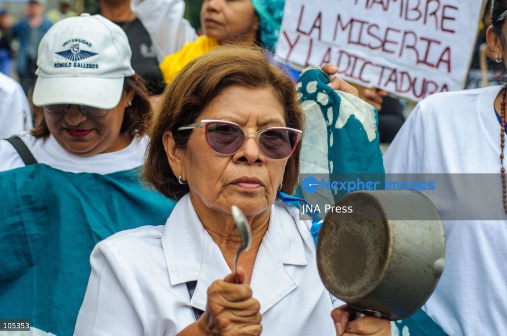 CARACAS, VENEZUELA, OCTOBER 13, 2026: Healthcare workers, teachers and university staff demonstrate in central Caracas to demand higher wages and improved labour benefits. Police block the march towards Miraflores Palace, while a union delegation proceeds to deliver signatures supporting the workers' demands. Photo by Mario Flores / JNA Press. (Photo by Mario Flores/JNA Press via Nexpher Images)