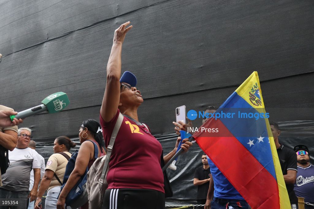 CARACAS, VENEZUELA, OCTOBER 13, 2026: Healthcare workers, teachers and university staff demonstrate in central Caracas to demand higher wages and improved labour benefits. Police block the march towards Miraflores Palace, while a union delegation proceeds to deliver signatures supporting the workers' demands. Photo by Mario Flores / JNA Press. (Photo by Mario Flores/JNA Press via Nexpher Images)
