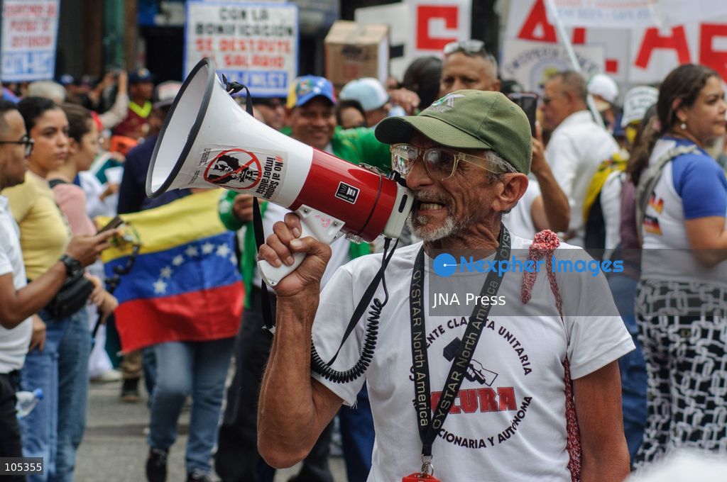 CARACAS, VENEZUELA, OCTOBER 13, 2026: Healthcare workers, teachers and university staff demonstrate in central Caracas to demand higher wages and improved labour benefits. Police block the march towards Miraflores Palace, while a union delegation proceeds to deliver signatures supporting the workers' demands. Photo by Mario Flores / JNA Press. (Photo by Mario Flores/JNA Press via Nexpher Images)
