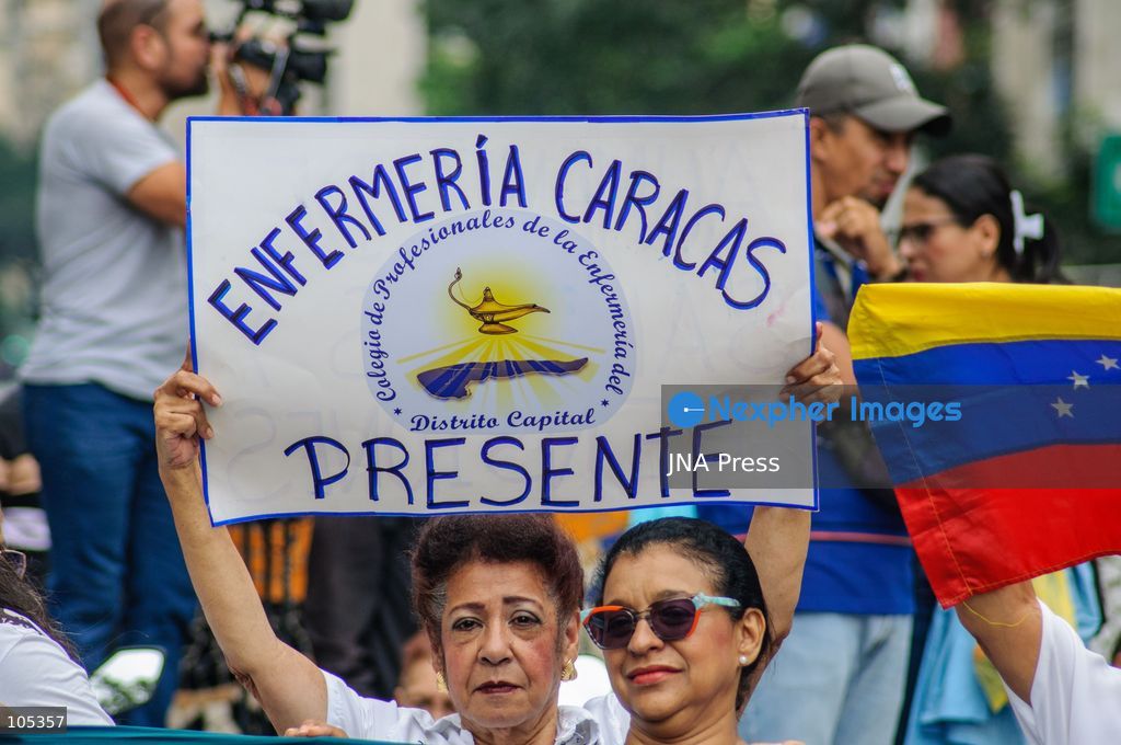 CARACAS, VENEZUELA, OCTOBER 13, 2026: Healthcare workers, teachers and university staff demonstrate in central Caracas to demand higher wages and improved labour benefits. Police block the march towards Miraflores Palace, while a union delegation proceeds to deliver signatures supporting the workers' demands. Photo by Mario Flores / JNA Press. (Photo by Mario Flores/JNA Press via Nexpher Images)