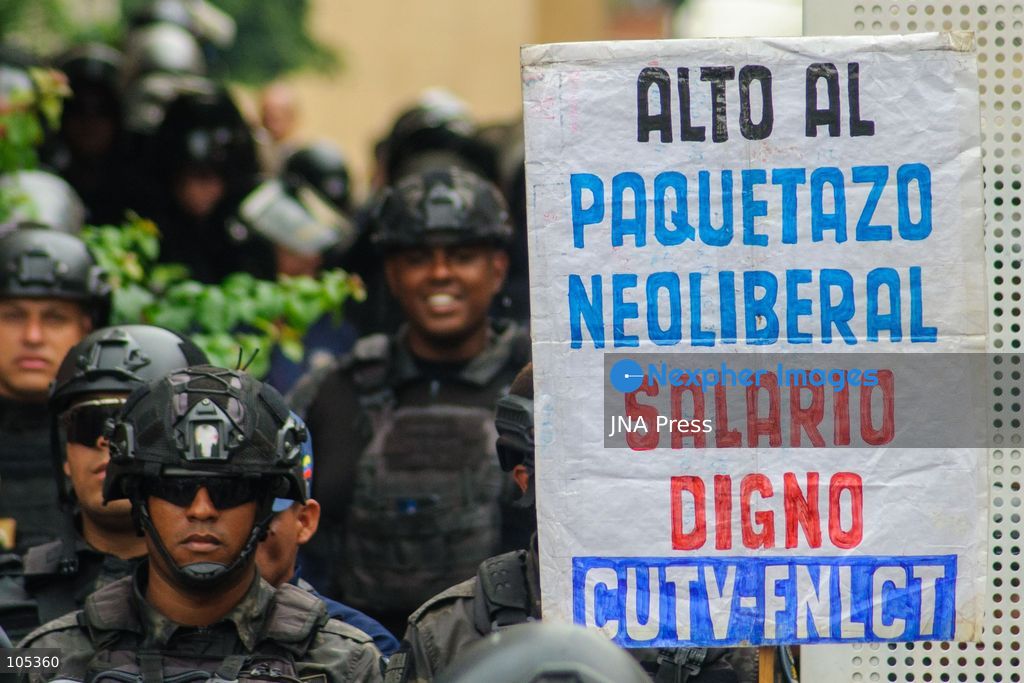 CARACAS, VENEZUELA, OCTOBER 13, 2026: Healthcare workers, teachers and university staff demonstrate in central Caracas to demand higher wages and improved labour benefits. Police block the march towards Miraflores Palace, while a union delegation proceeds to deliver signatures supporting the workers' demands. Photo by Mario Flores / JNA Press. (Photo by Mario Flores/JNA Press via Nexpher Images)