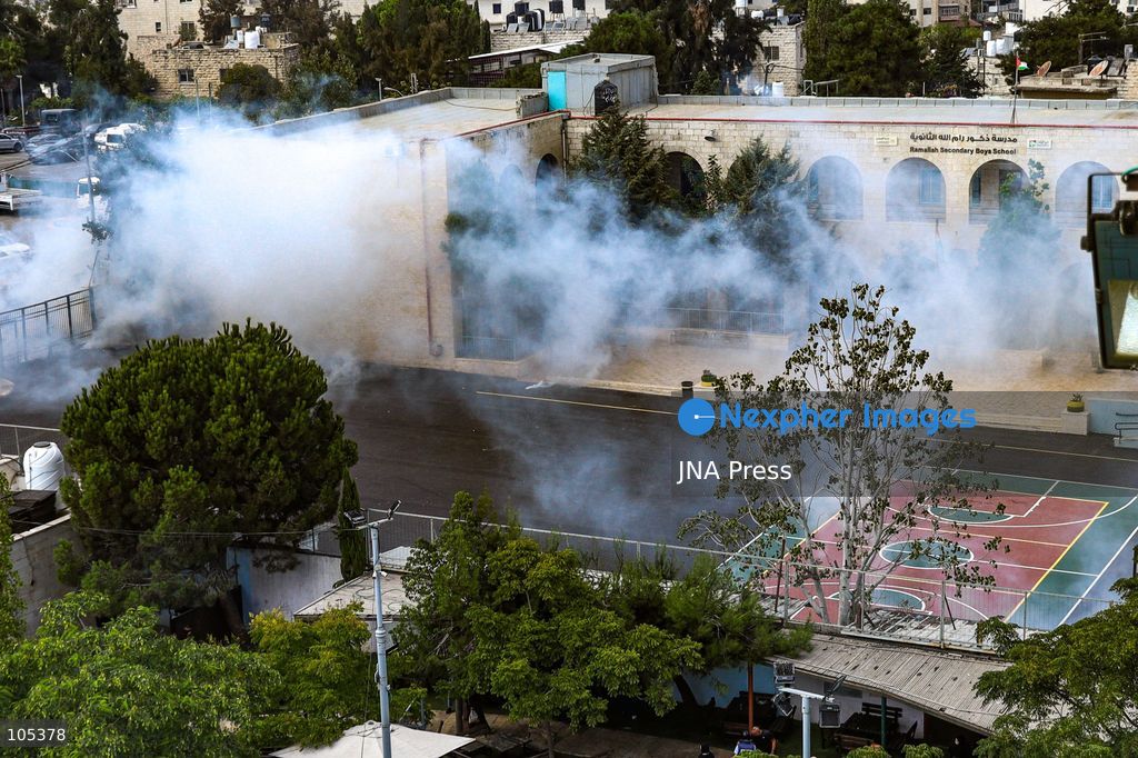 RAMALLAH, WEST BANK, PALESTINE, OCTOBER 13, 2026: Israeli forces conduct a raid in Ramallah in the occupied West Bank. The operation includes a raid on the offices of Addameer Prisoner Support and Human Rights Association. The Palestinian Ministry of Health reported two people wounded, including a 14-year-old boy wounded by Israeli gunfire, while several others were treated for tear gas inhalation. Photo by Salman Mohsen Alkhatib / JNA Press. (Photo by Salman Mohsen Alkhatib/JNA Press via Nexpher Images)